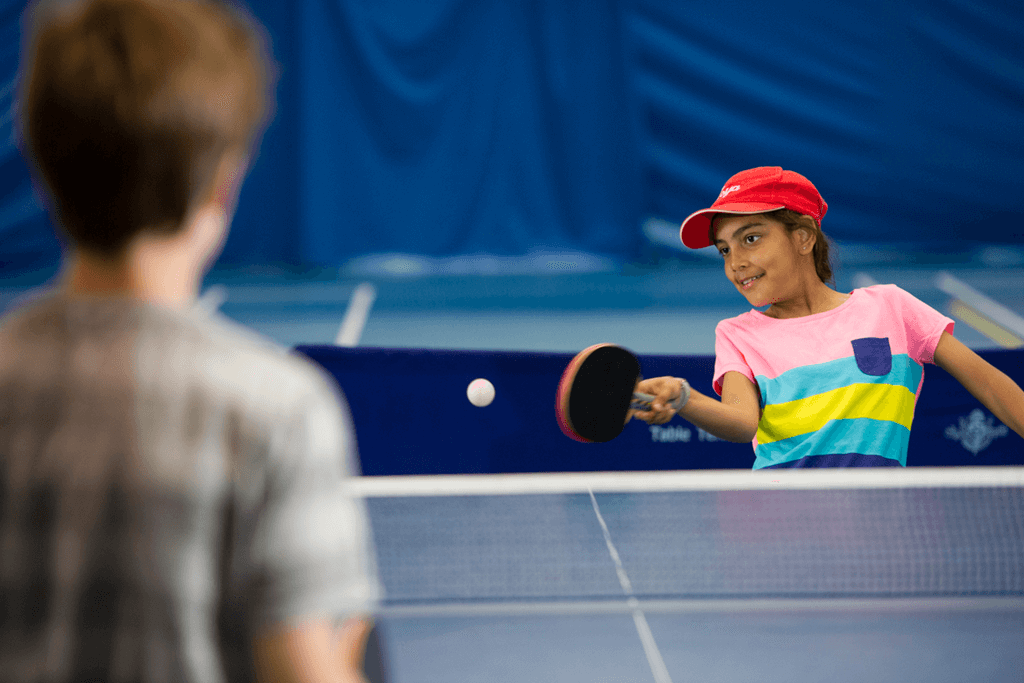 Kids playing table tennis